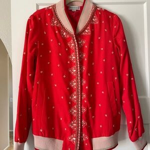 Anthropologie Red Bomber Jacket with unique embroidery.